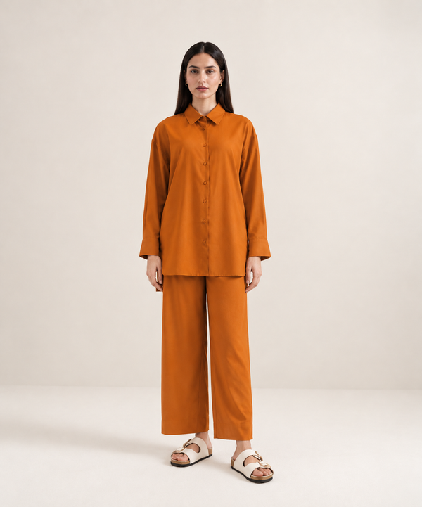 Rust-orange imported khaddar co-ord set with collared shirt and wide-leg trousers