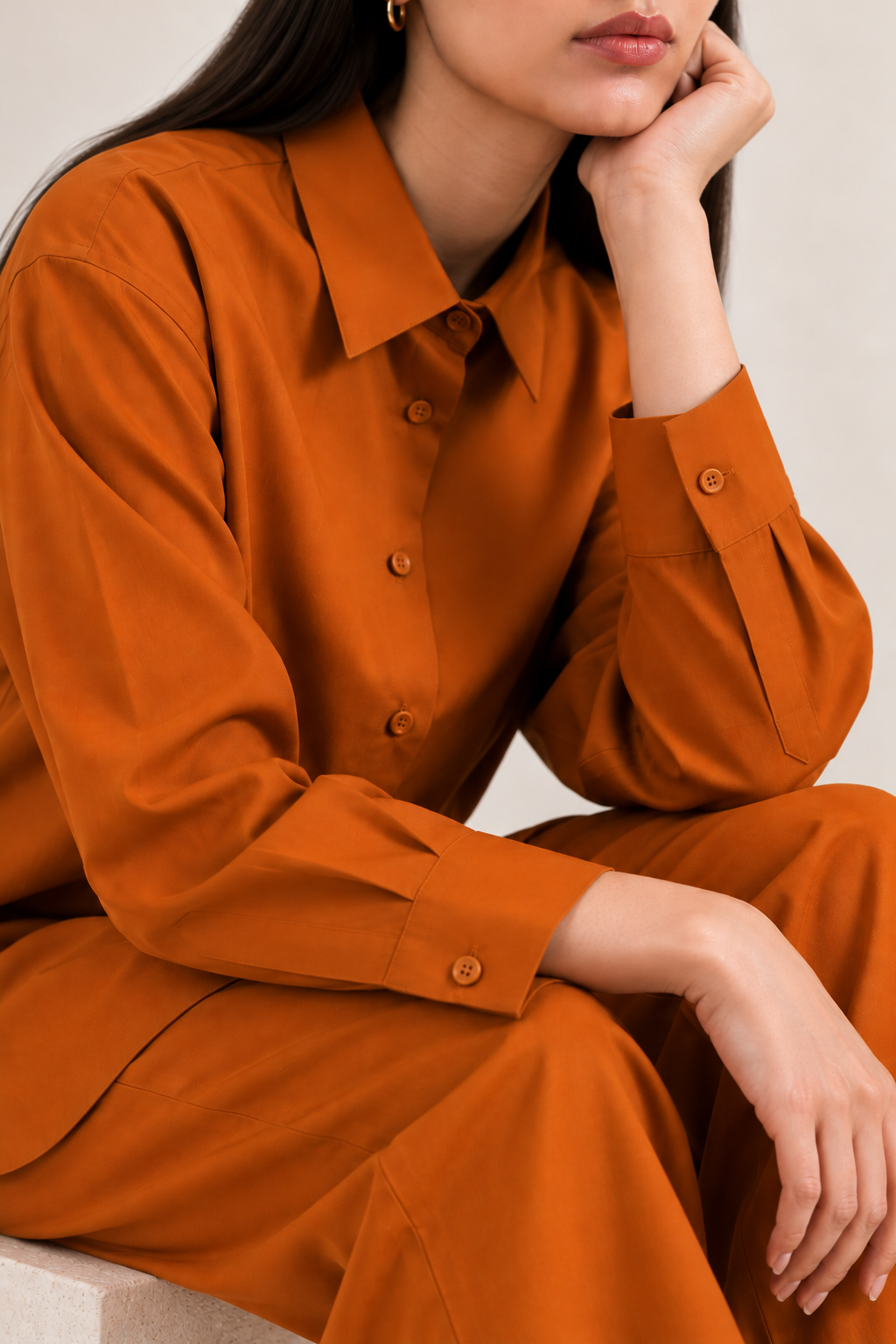 Front view of rust-orange collared button-down co-ord set